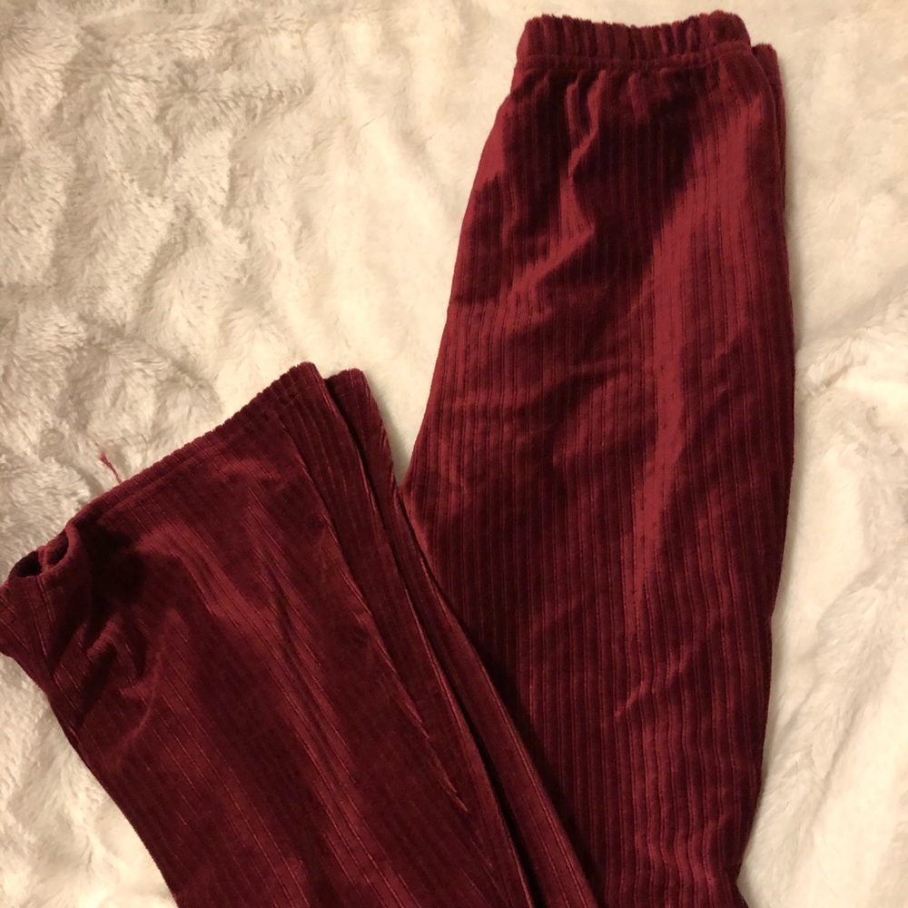 Maroon ribbed velvet flare pants